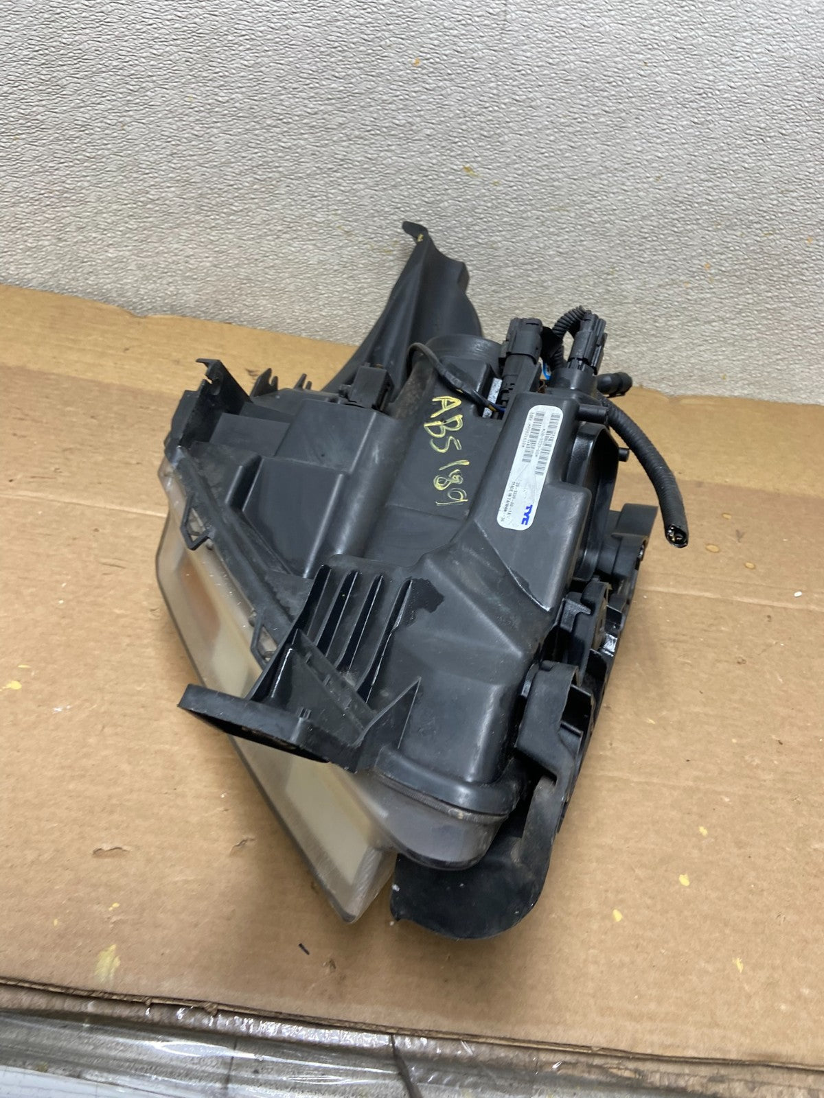 2011 to 2015 Ford Explorer Right Passenger Halogen Headlight TYC AB5189 DW9