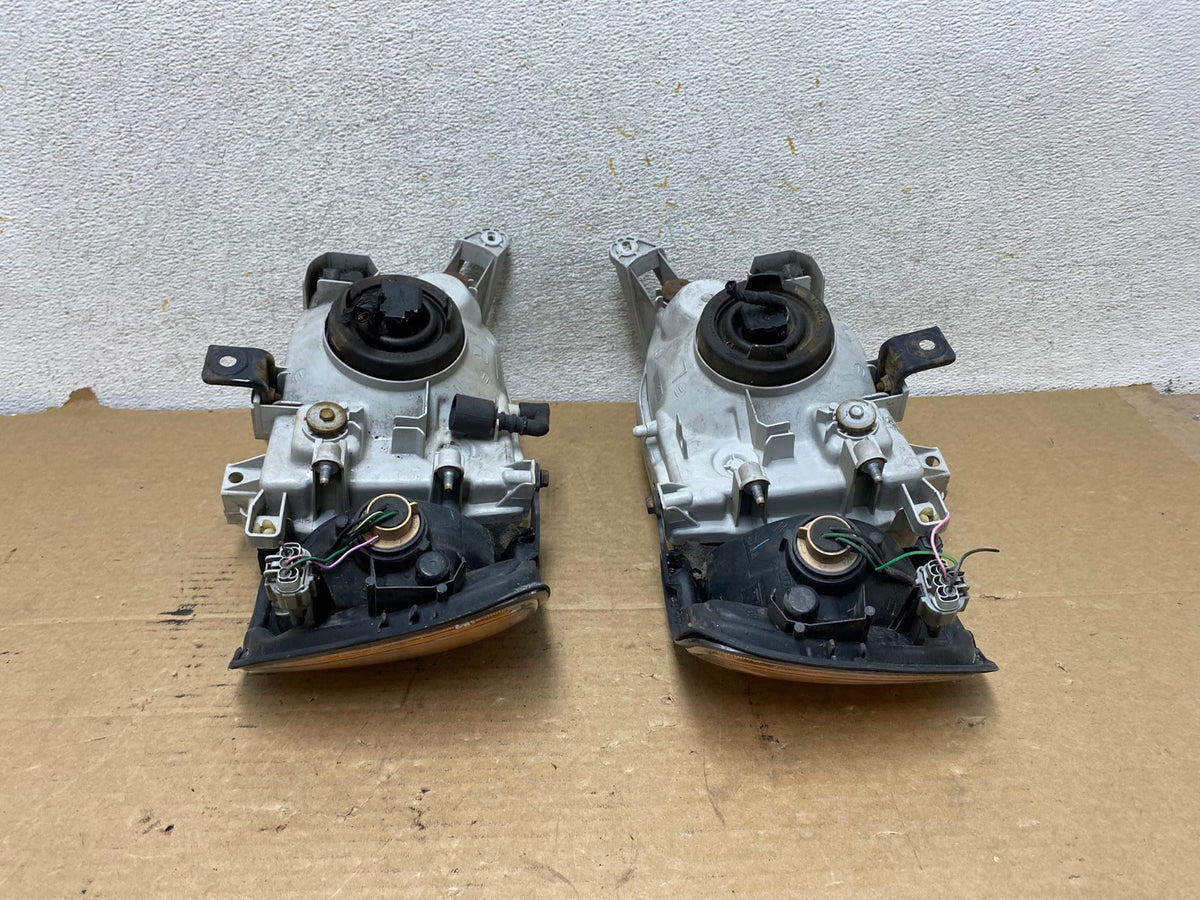 1999-2004 Nissan Pathfinder Left+Right Side Set Halogen Headlights AH8022 LK7