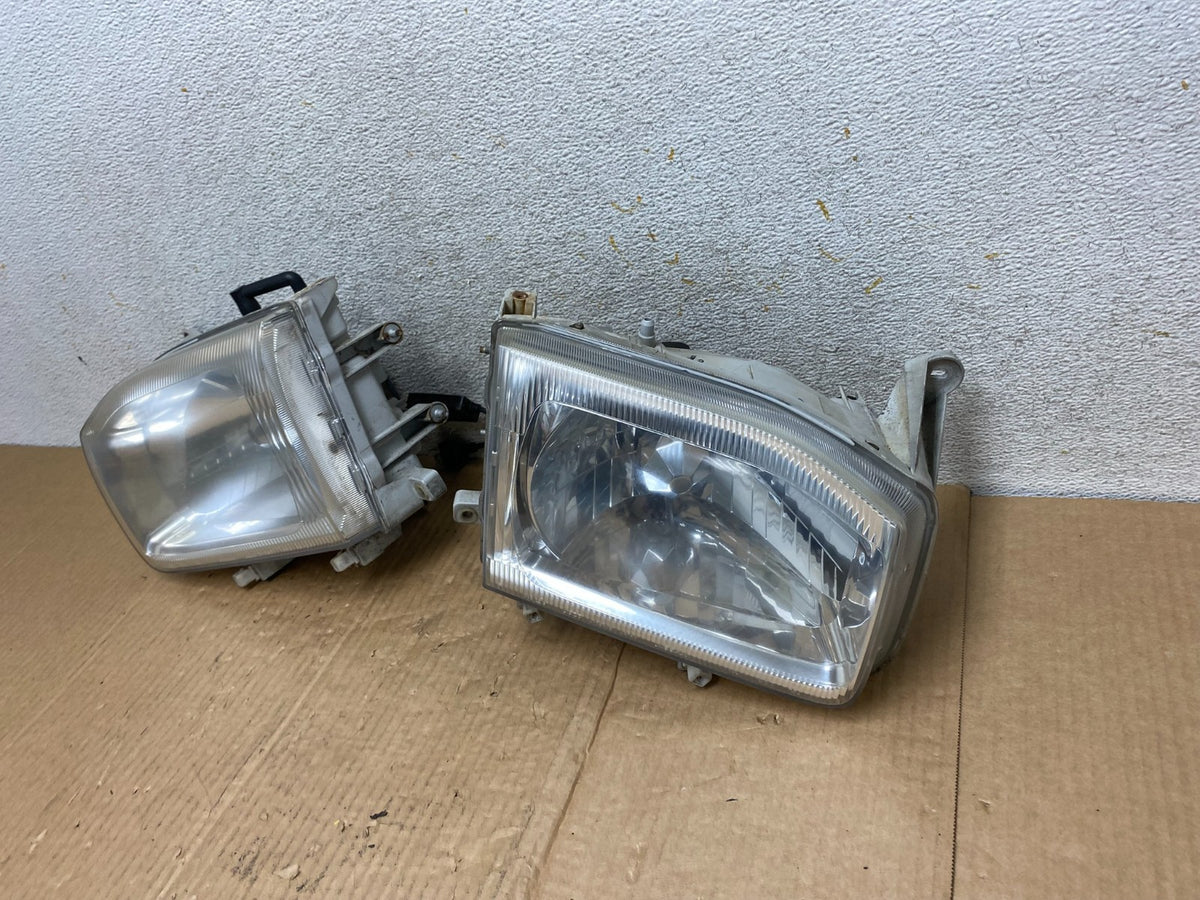 1999-2004 Nissan Pathfinder Left+Right Side Set Halogen Headlights AI6516 DW1