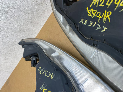 2002 to 2003 Mitsubishi Galant Left+Right Side Headlights AE3173 DW9