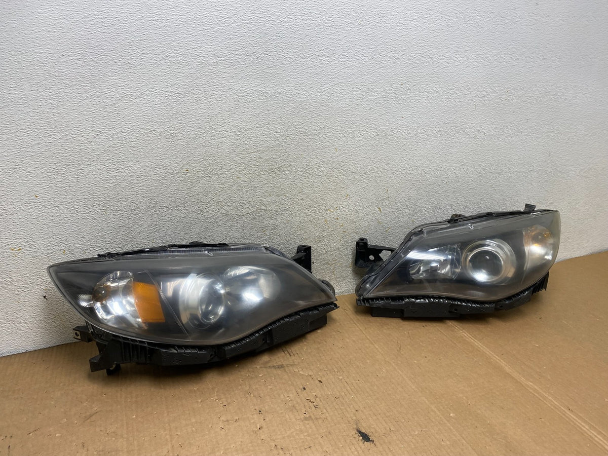 2008 to 2011 Subaru Impreza Left+Right Side Halogen Headlights TYC AI8815 DW2