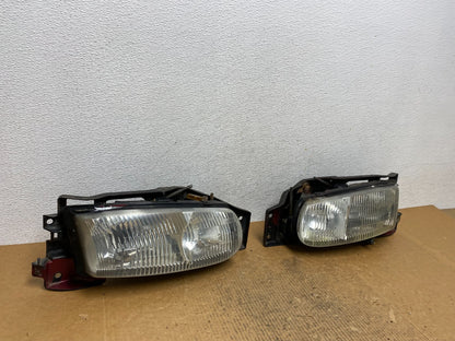 1995 to 1996 Buick Riviera Left+Right Headlights AE16142