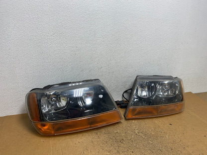 1999 - 2004 Jeep Grand Cherokee Left+Right Set Halogen Headlights AE2883 DW2