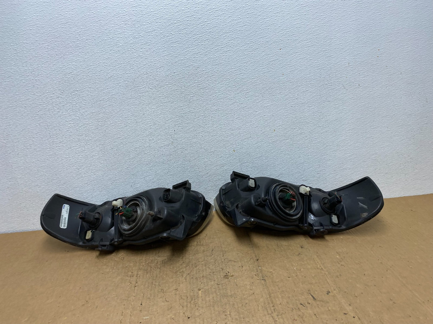 2004 - 2006 Nissan Sentra Halogen Left+Right Headlights TYC AD0566 DW4
