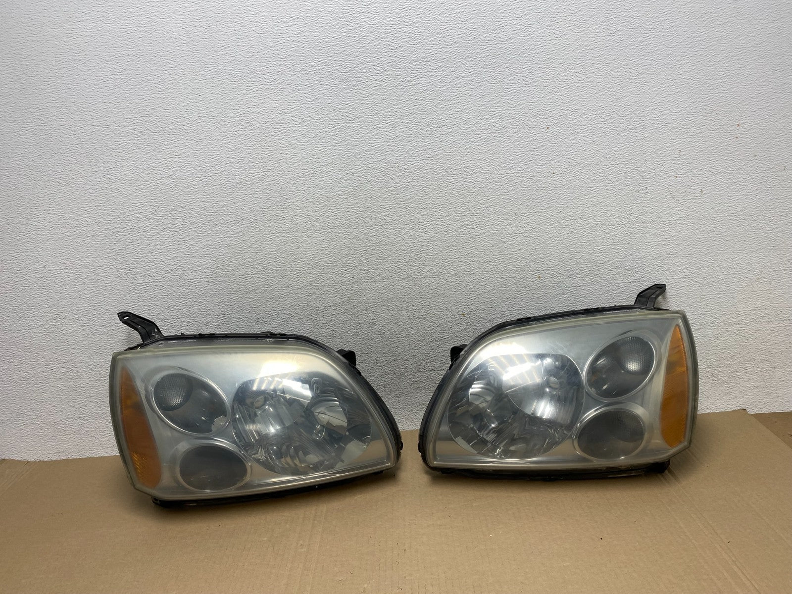 2004 - 2009 Mitsubishi Galant Left+Right Headlights Halogen AF5769 DW0