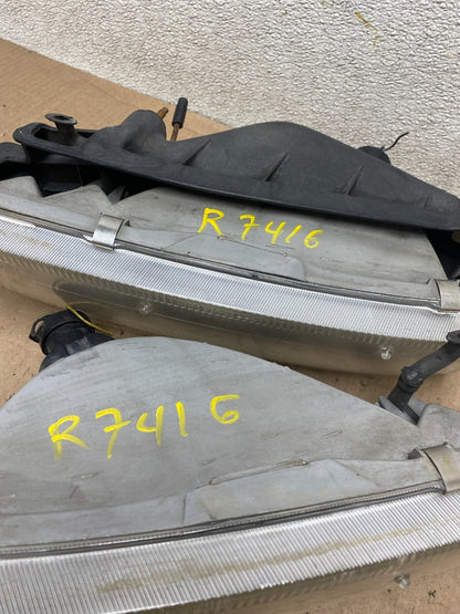 1997 to 1999 Nissan Maxima Left+Right Side Headlights Halogen OEM R7416 DW11