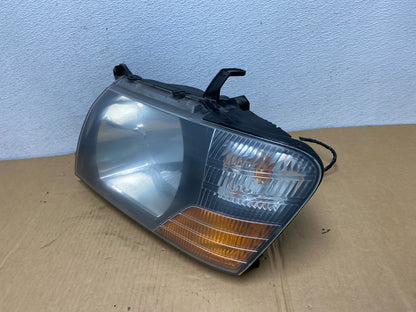 2000 to 2004 Mitsubishi Montero Pajero Left Driver LH Headlight AC7499 DW1
