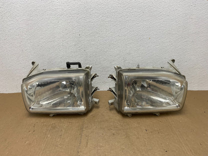 1999-2004 Nissan Pathfinder Left+Right Side Set Halogen Headlights AC5822 DW0