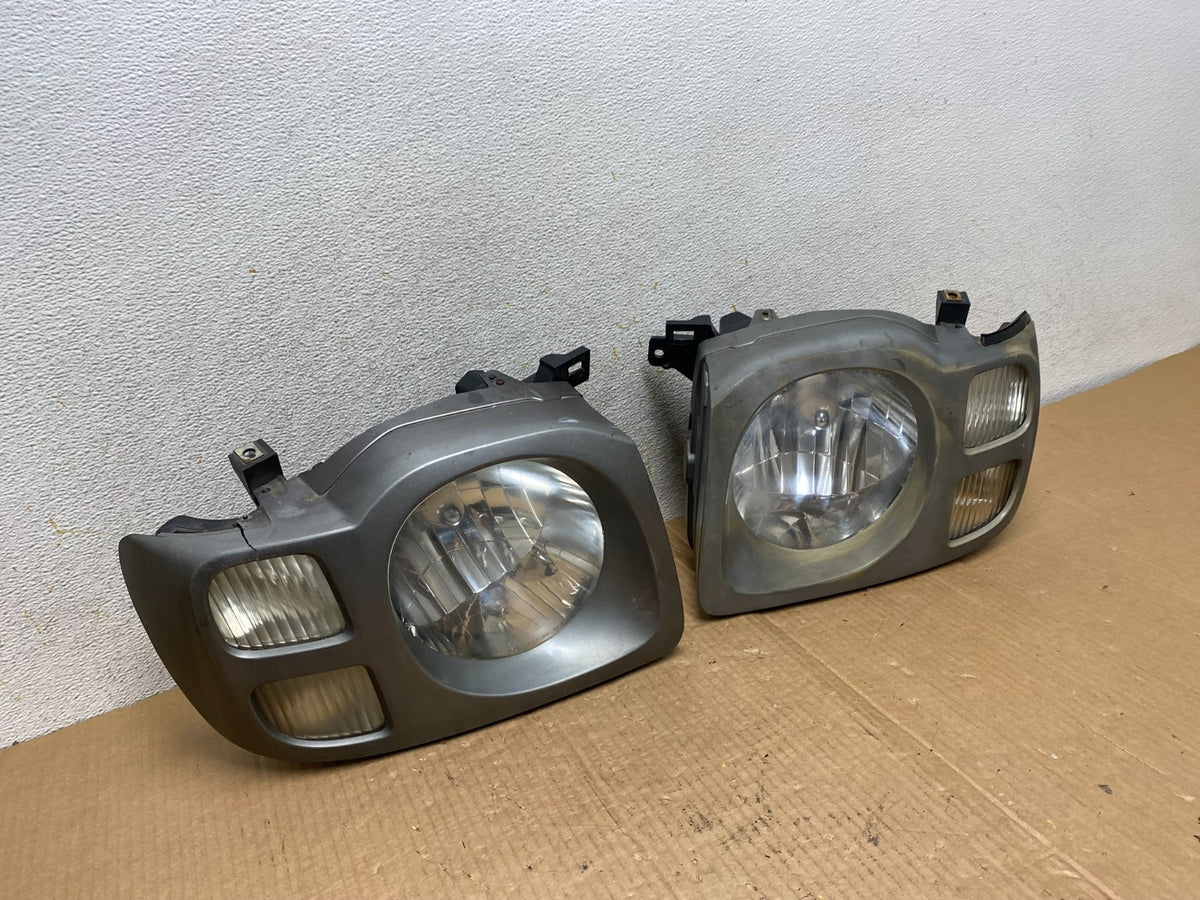 2002 2003 2004 Nissan Xterra Left+Right Side Headlights DEPO AI6519 DW2