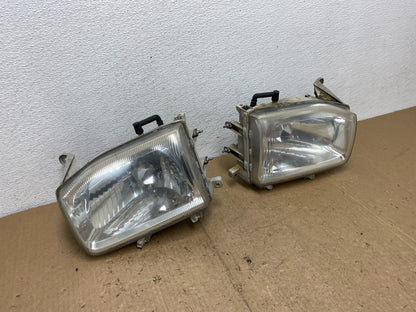 1999-2004 Nissan Pathfinder Left+Right Side Set Halogen Headlights AC6011 DW2