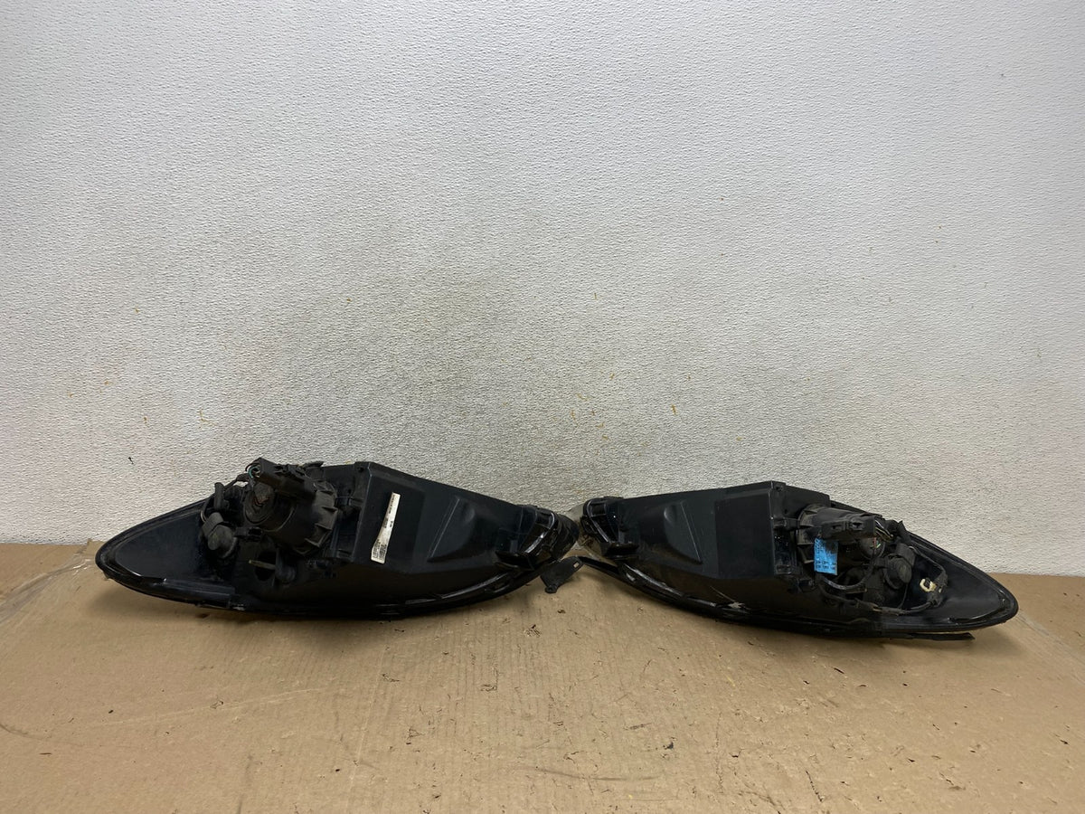 2000 to 2007 Ford Taurus Left+Right Side Halogen Headlights AH7649 DW4