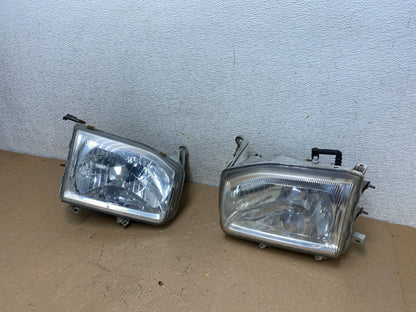 1999-2004 Nissan Pathfinder Left+Right Side Set Halogen Headlights P8186 DW1