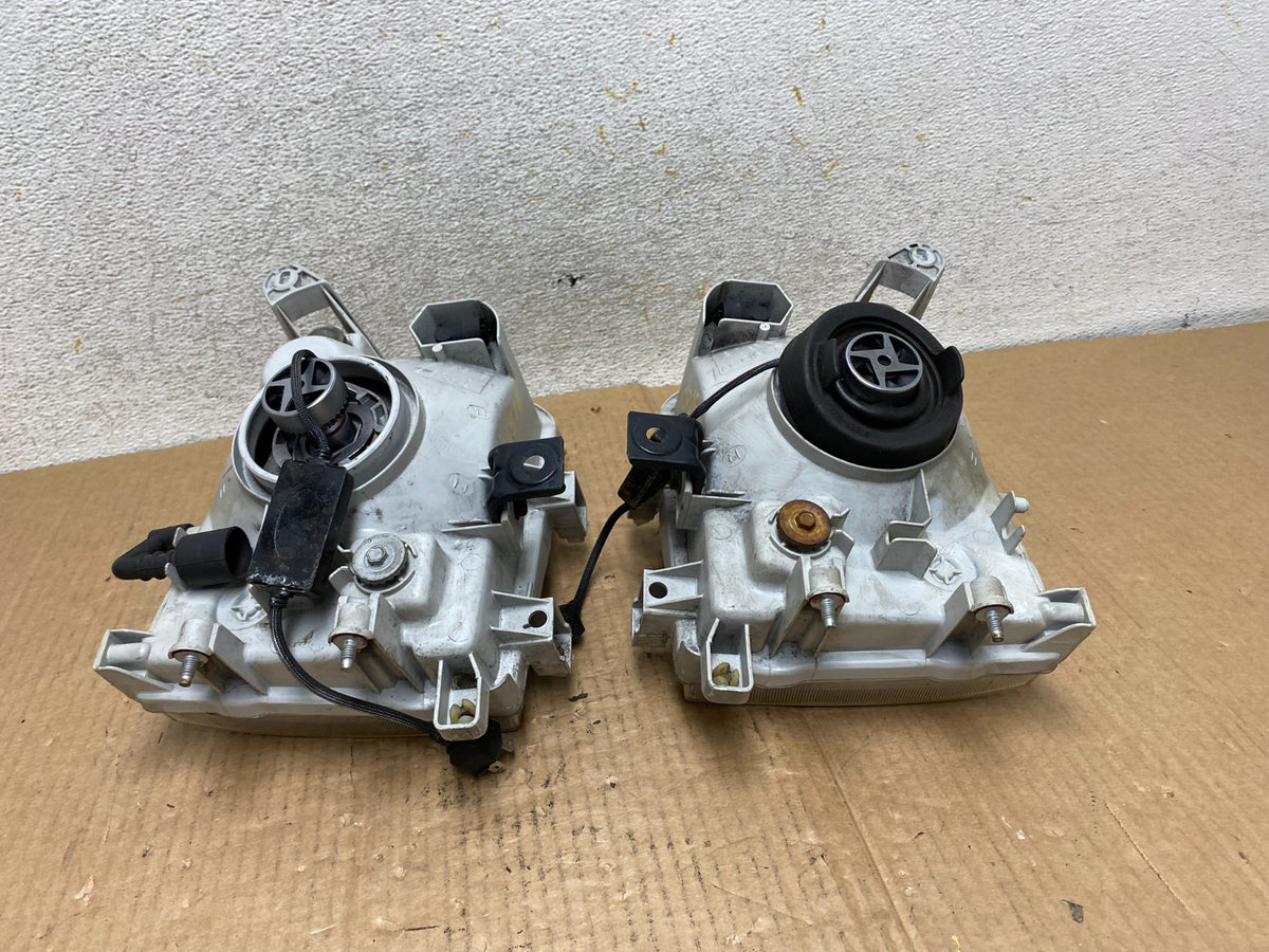 1999-2004 Nissan Pathfinder Left+Right Side Set Halogen Headlights AI6516 DW8