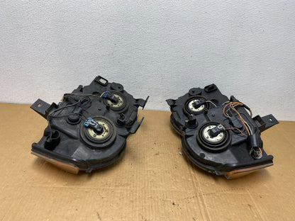 2009-2010 Jeep Grand Cherokee Left+Right Set Halogen Headlights AC7707 DW11