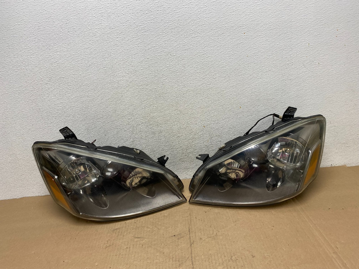 2005 to 2006 Nissan Altima Left+Right Side Set Halogen Headlights AG4667 DW0
