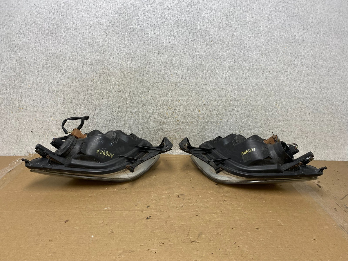 2006 to 2009 Ford Fusion Headlights Left+Right Side AH8427 DW8