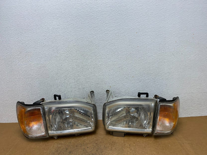 1999-2004 Nissan Pathfinder Left+Right Side Set Halogen Headlights AE1365 DW0
