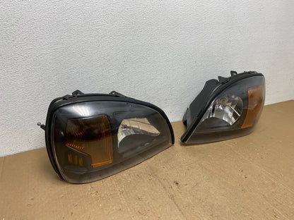 2000 to 2005 Cadillac Deville Left+Right Side Black Headlights AC5974 DG2
