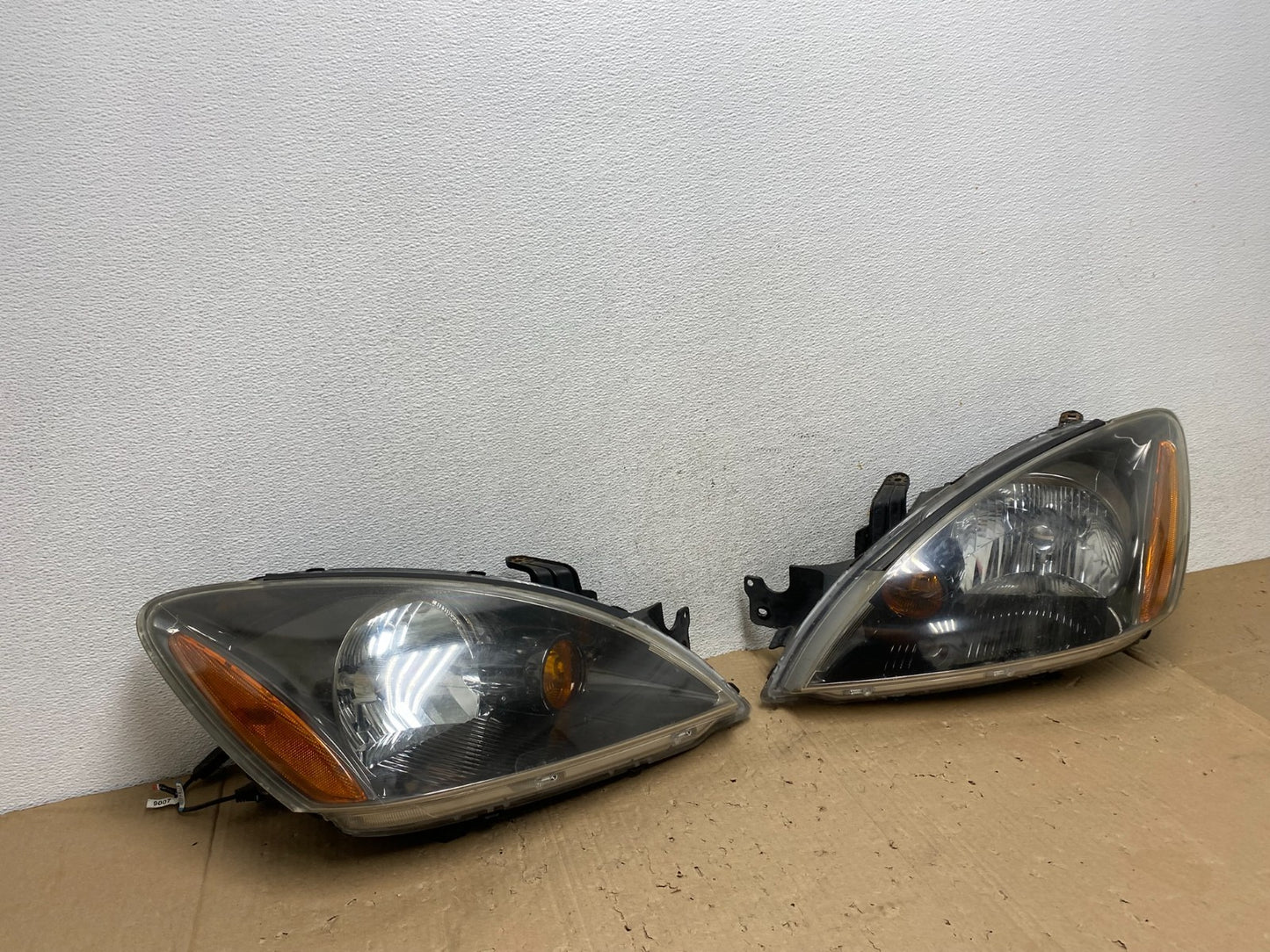 2004-2007 Mitsubishi Lancer Left+Right Side Headlights Halogen AE9289 DW2
