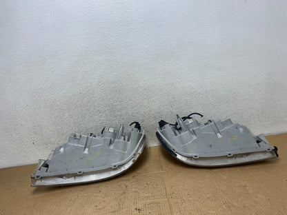 2002 to 2005 Kia Sedona Left+Right Side Headlights AI8165 DW9
