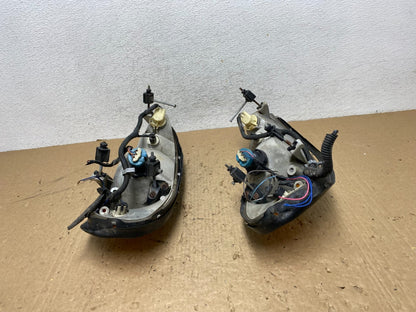 1999 to 2005 Pontiac Grand Am Left+Right Set Headlights AG1428 DW9