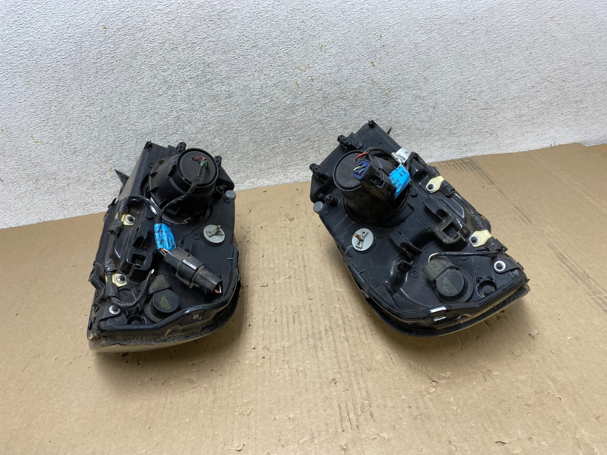 2000 to 2005 Mercury Sable Left+Right Side Halogen Headlights AJ2144 DW10