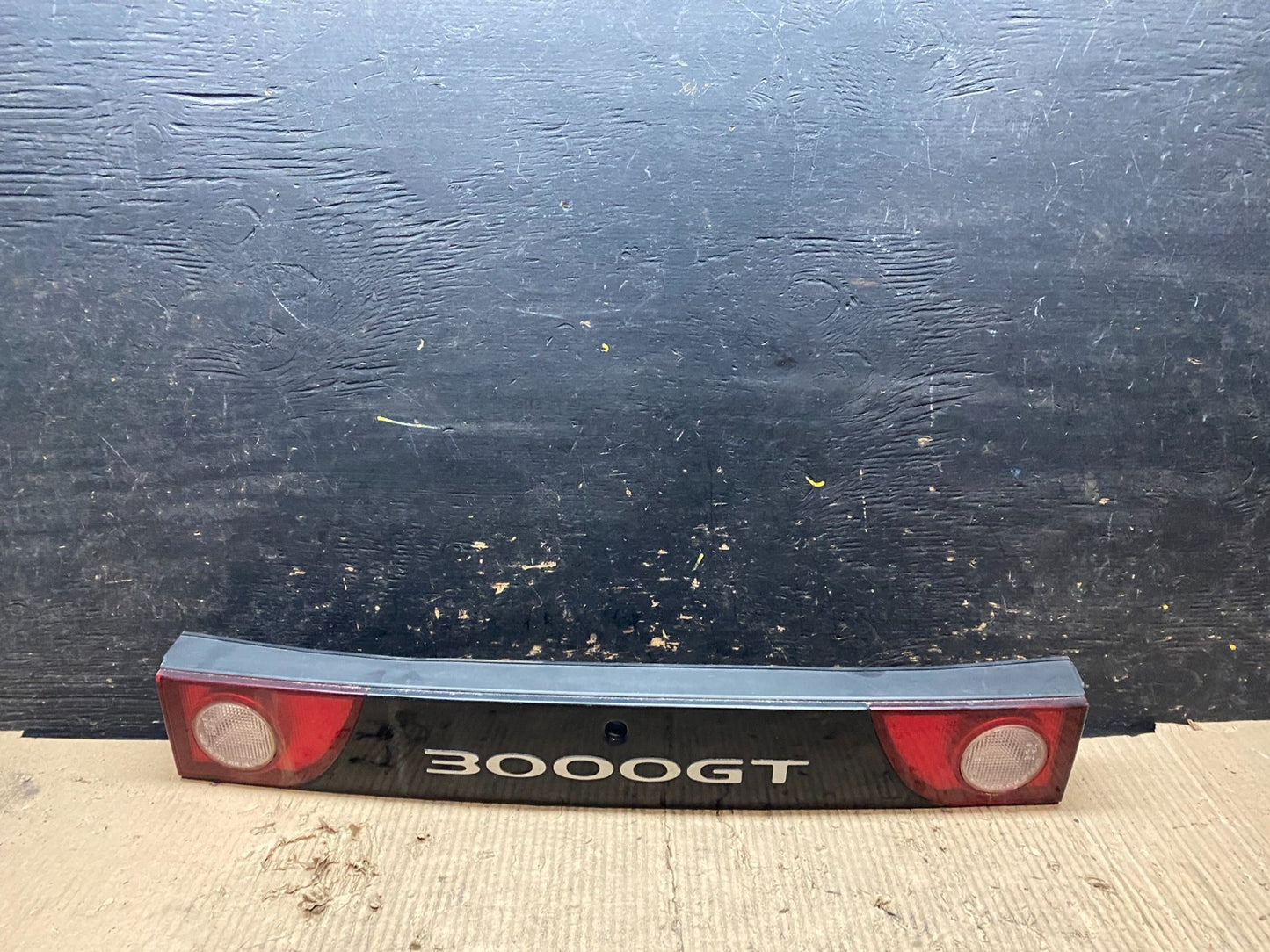 1995 to 1998 Mitsubishi 3000GT Rear Center Trunk Tail Light Panel v4262 DG0