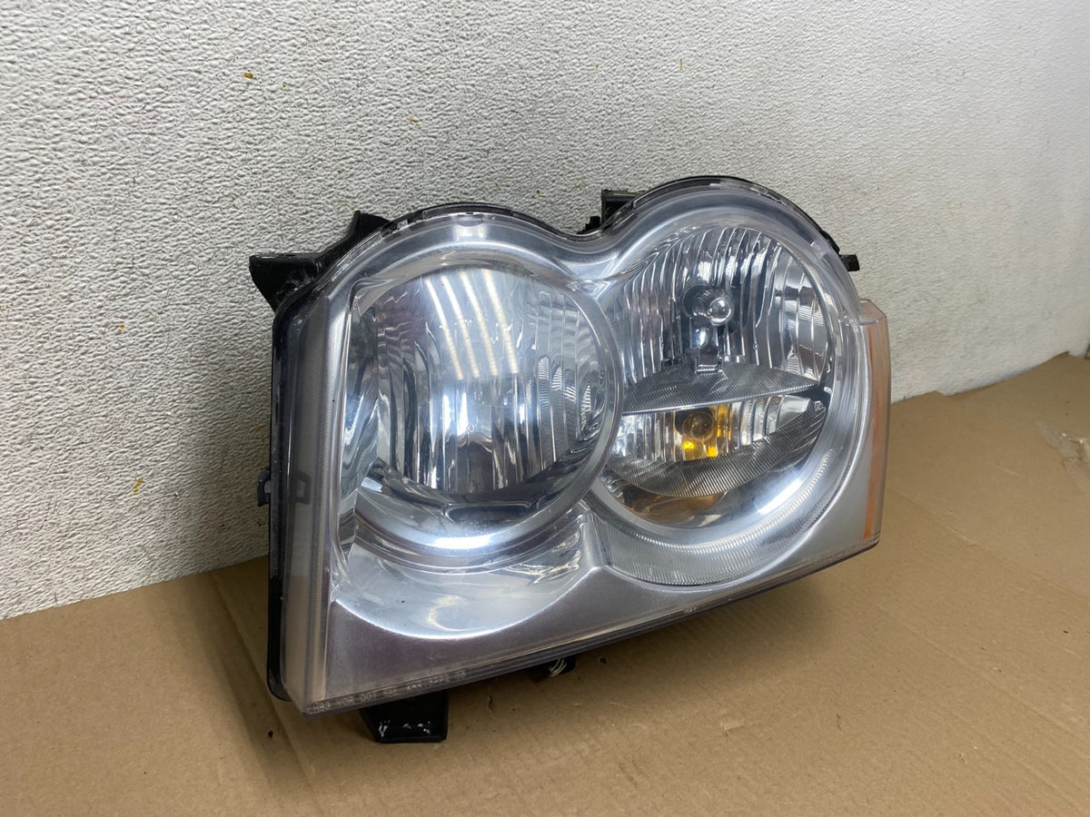 2005-2007 Jeep Grand Cherokee Left Driver LH Halogen Headlight TYC AI1174 DW2