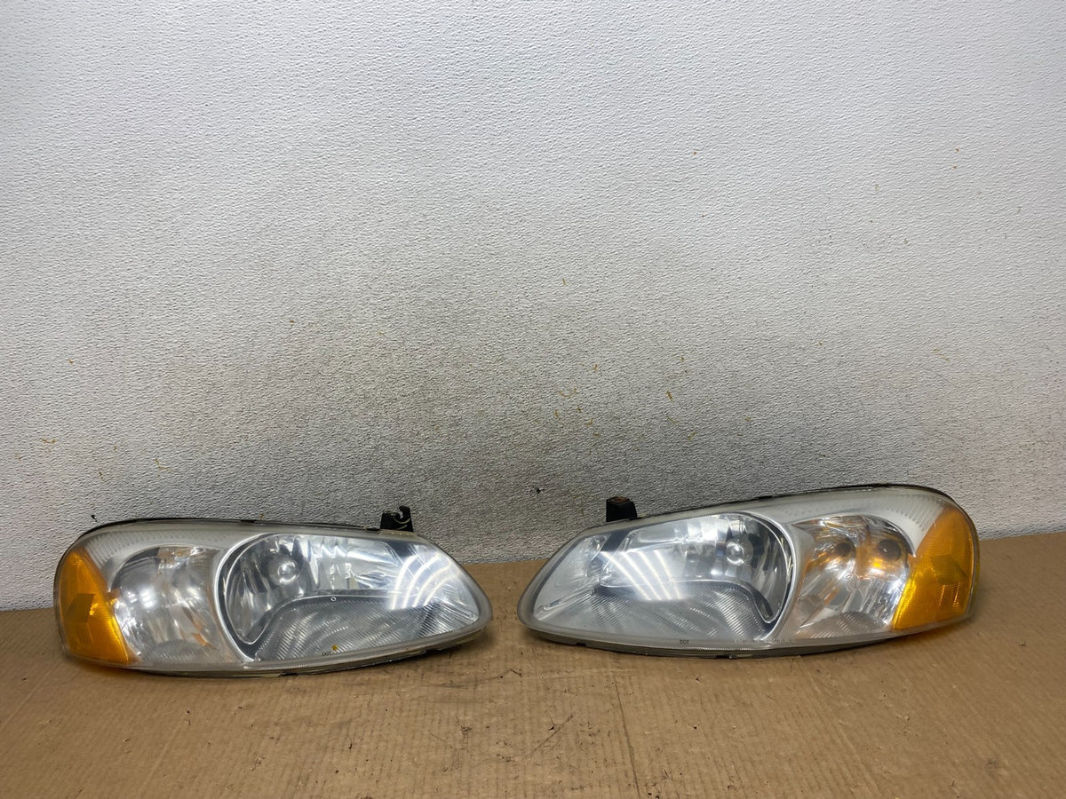 2001 to 2002 Chrysler Sebring Left+Right Side Headlights AI7896 DW0