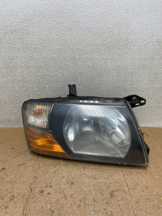 2000 to 2004 Mitsubishi Montero Pajero Right Passenger RH Headlight AA4270 DW0