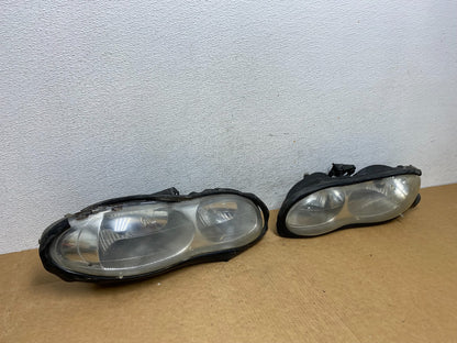 1998 to 2002 Chevrolet Camaro Pair Left and Right Headlights ad4504 DG2