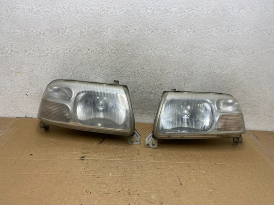 1999-2005 Suzuki Grand Vitara Left+Right Side Set Halogen Headlights AH8074 DW0