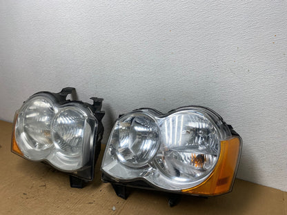 2009-2010 Jeep Grand Cherokee Left+Right Set Halogen Headlights AC7707 DW2