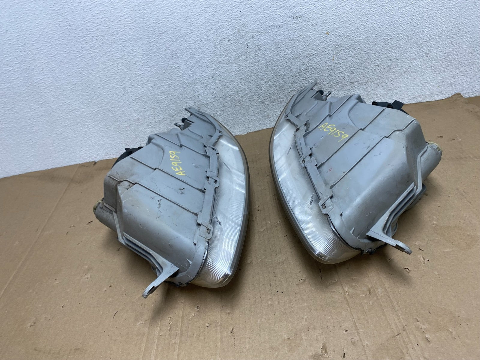 2004 - 2006 Chevrolet Aveo Hatchback Left+Right Headlights Halogen AE9159 DW9