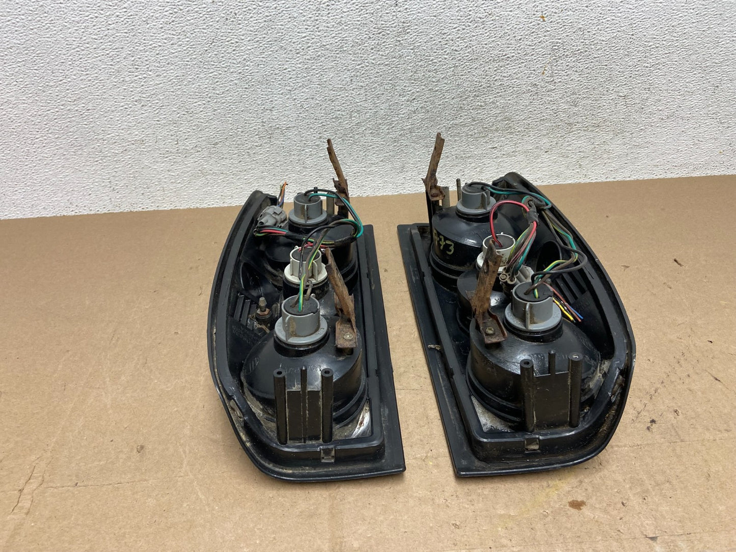 1998 to 2004 Nissan Frontier Left+Right Set Black Side Tail lights AE6773 DG10