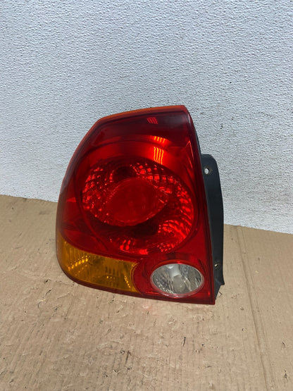 2003 to 2004 Hyundai Accent Sedan Left Driver LH Tail Light ae9069 DG0