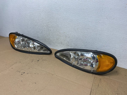 1999 to 2005 Pontiac Grand Am Left+Right Set Headlights AF4474 DW1