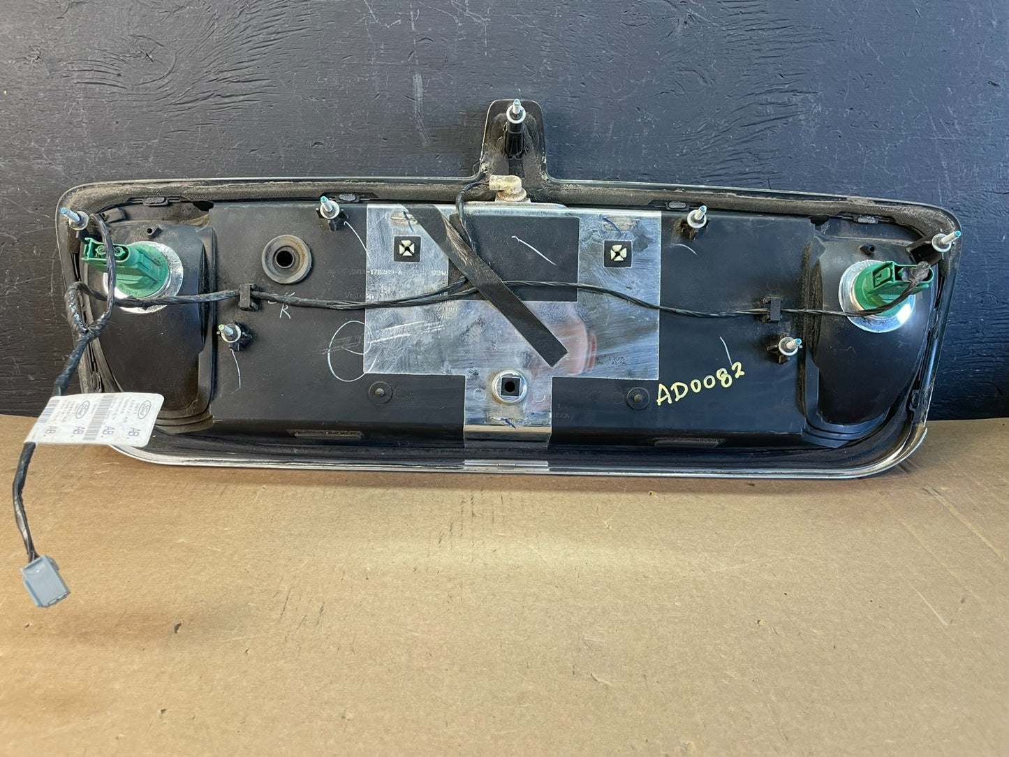 2003 to 2011 Lincoln Town Car Rear License Plate Trim Panel AD0082 DG5