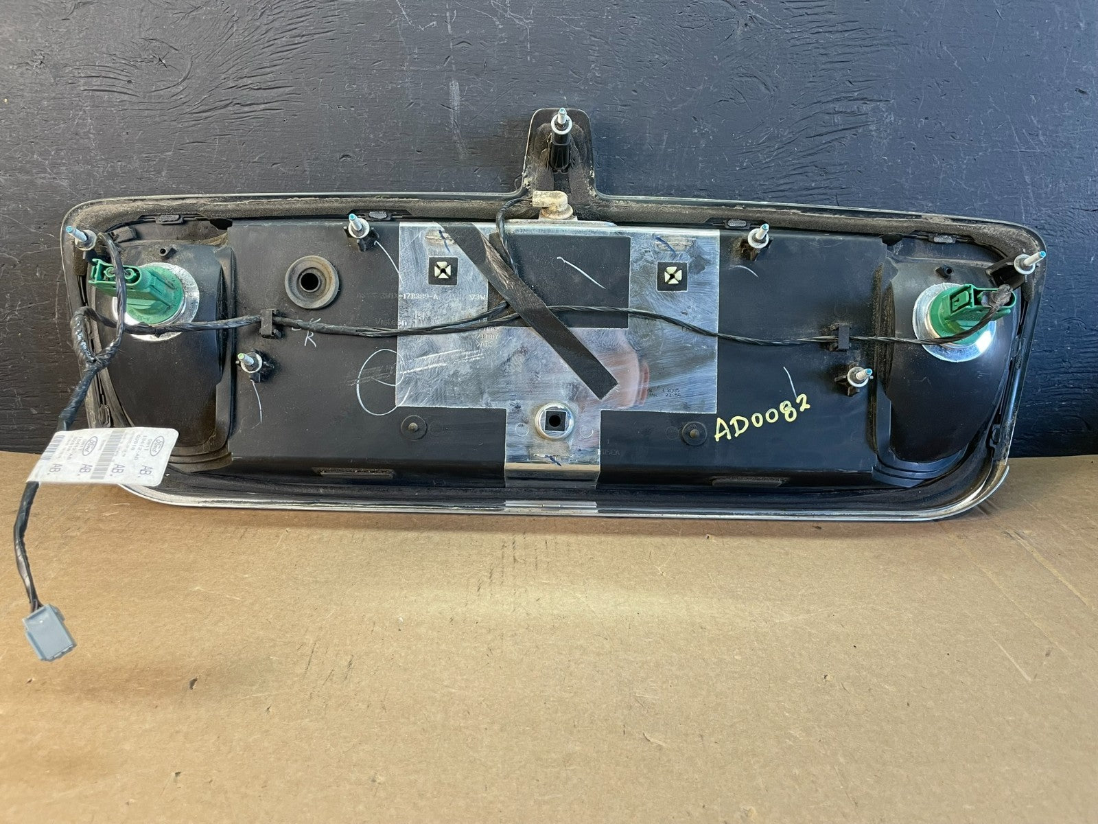 2003 to 2011 Lincoln Town Car Rear License Plate Trim Panel AD0082 DG5