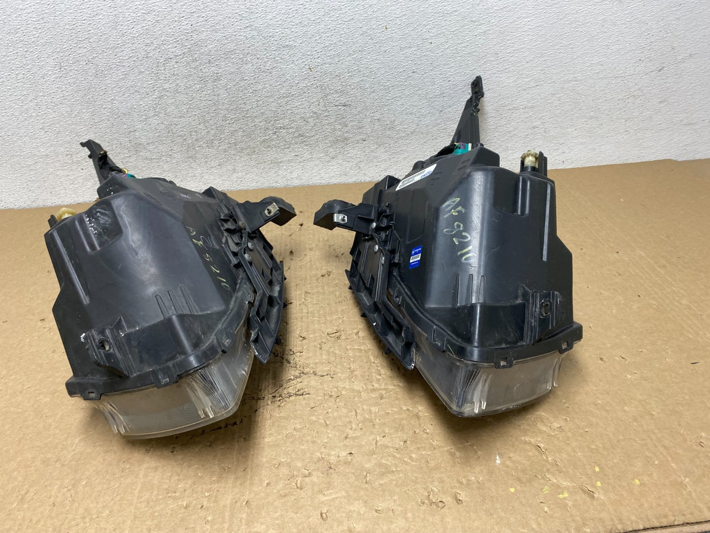 2011 to 2015 Chevrolet Cruze Halogen Left+Right Set Headlights AF8210 DW12