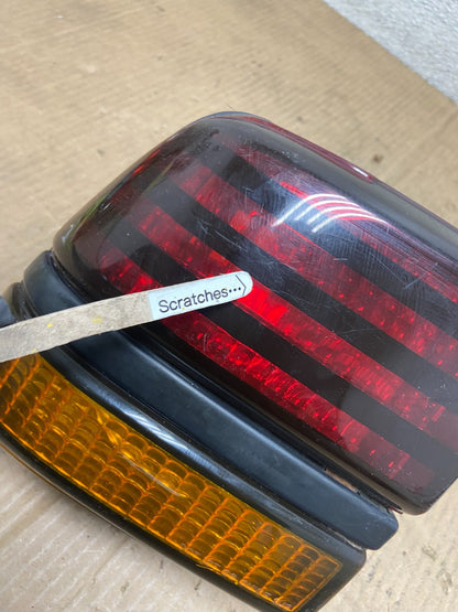 1988 to 1994 Pontiac Sunbird Left Driver Side Tail Light AA65933