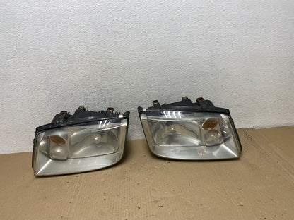 2002 to 2004 Volkswagen Jetta Left+Right Headlights AG6894 DW0