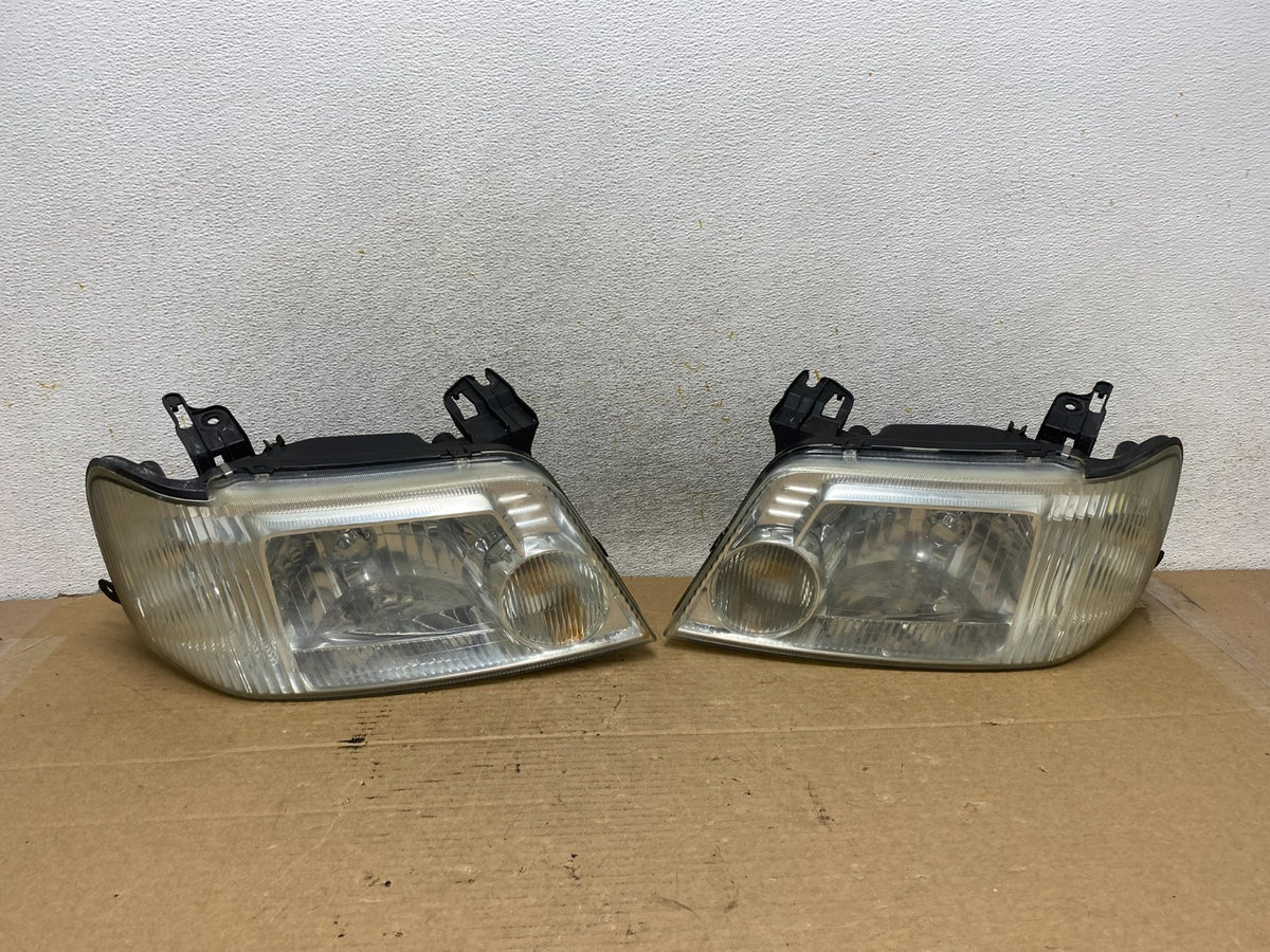 2005 to 2007 Mercury Mariner Left+Right Side Halogen Headlights AH7925 DW0