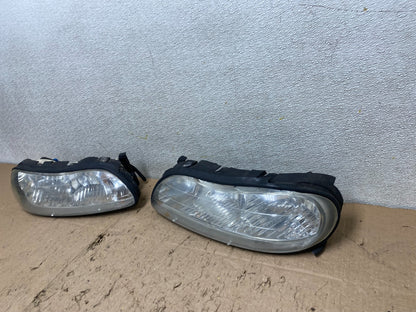 1997 to 2003 Chevrolet Malibu Left+Right Side Headlights OEM W3564 DW1