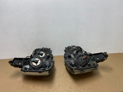 2004 to 2007 Nissan Armada Left+Right Side Set Headlights AC5976 DW11