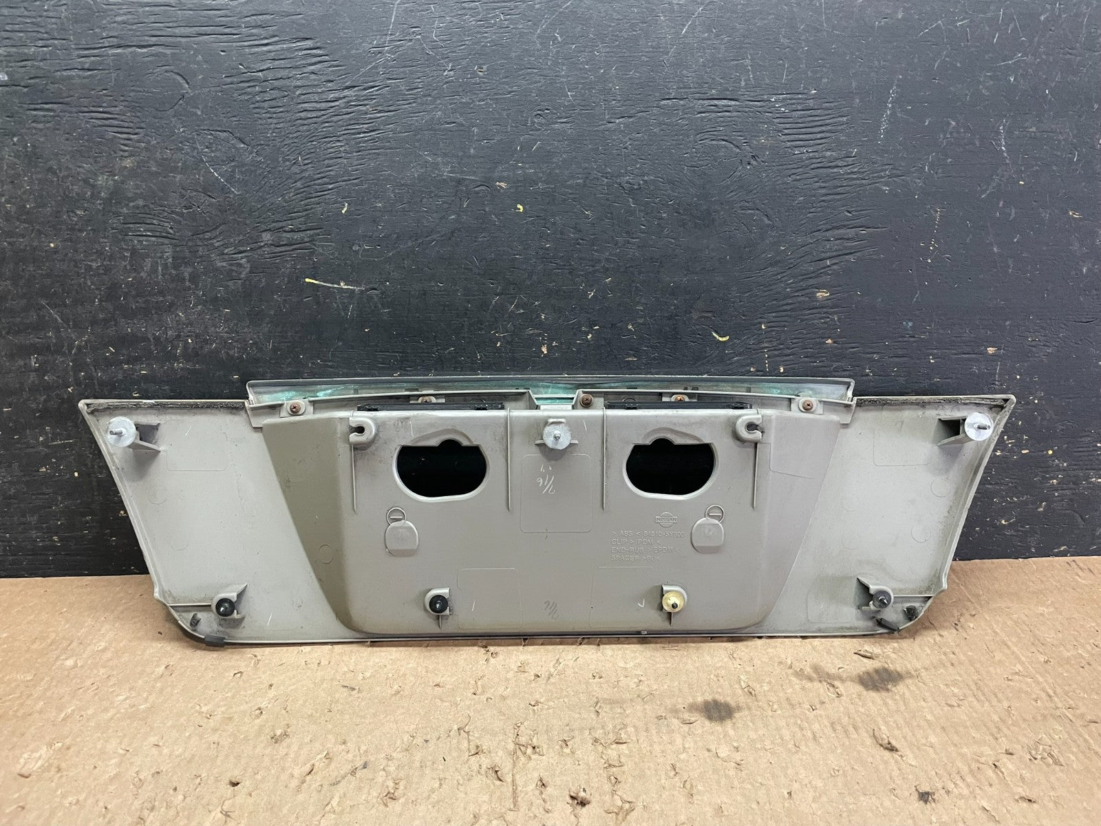 2002 2003 2004 Infiniti I35 Trunk Lid Rear License Plate Garnish OEM Z5598 DG7