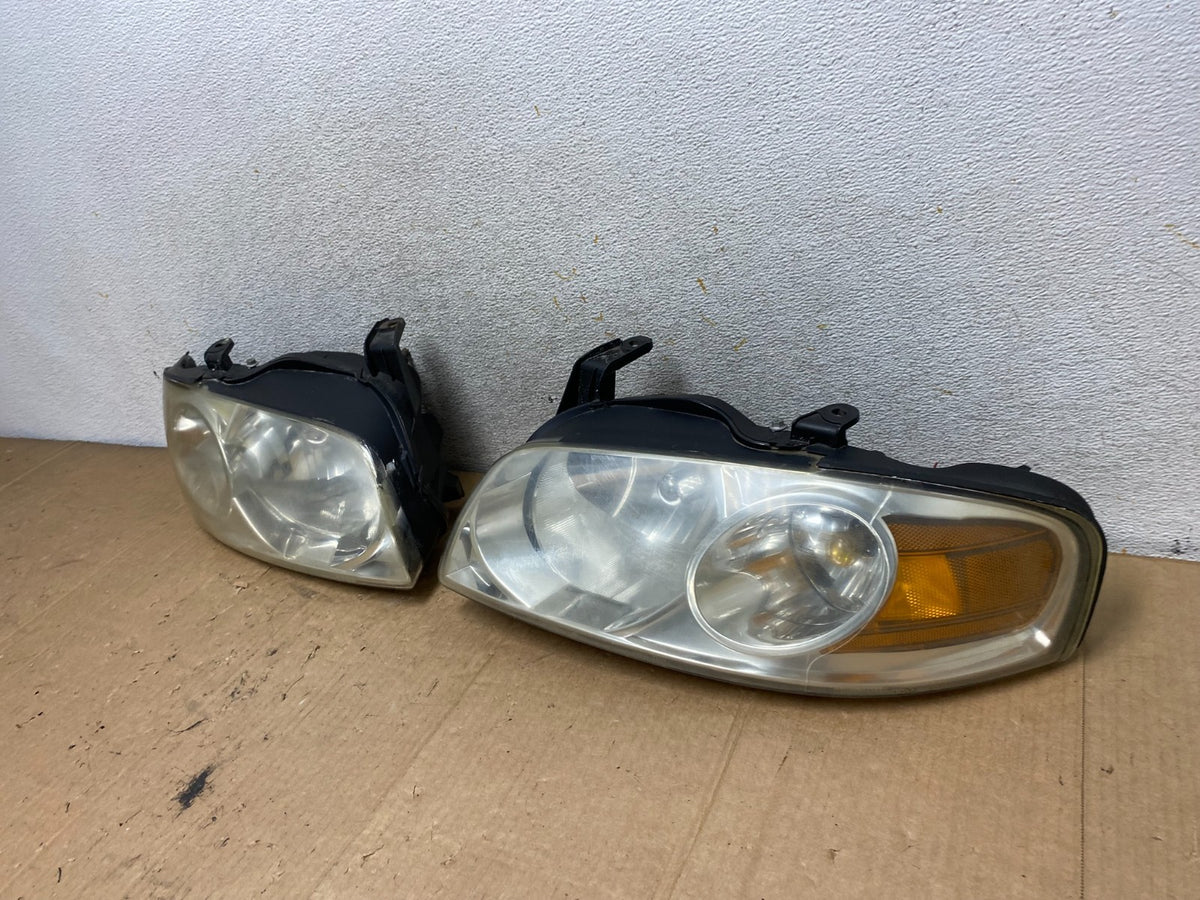 2004 - 2006 Nissan Sentra Halogen Left+Right Headlights AI8983 DW1