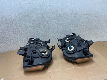 2005-2007 Jeep Grand Cherokee Left+Right Halogen Headlights AA9874 DW10