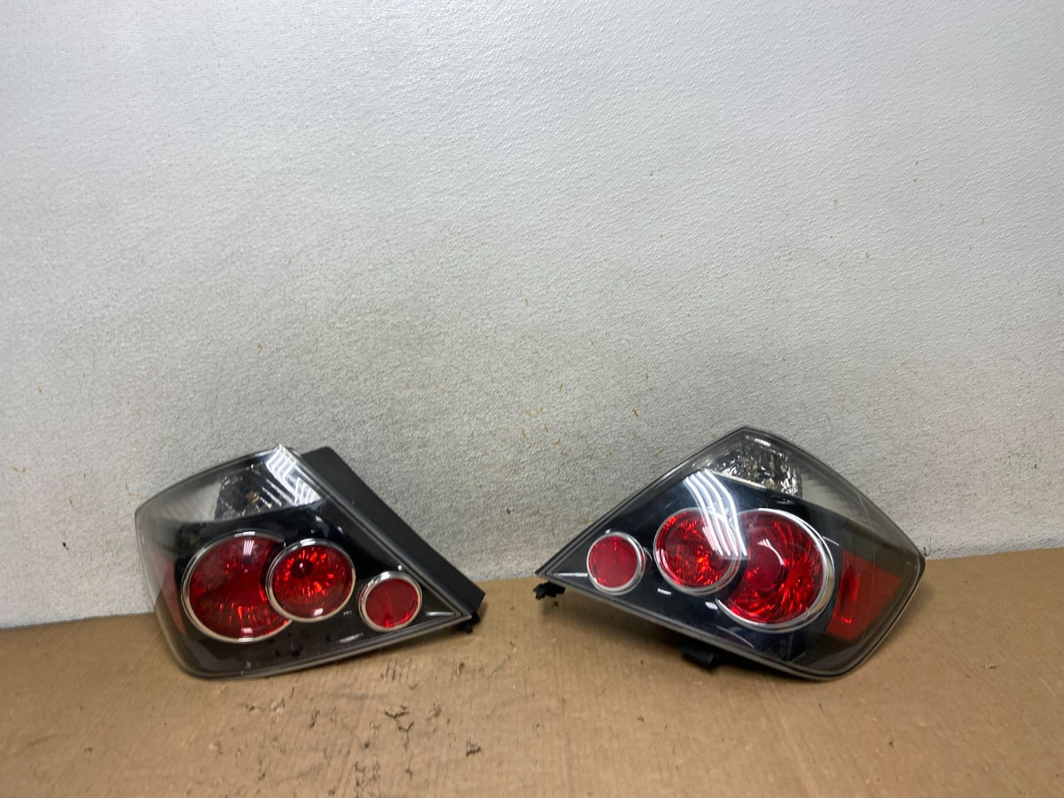 2007 to 2010 Scion TC Left + Right Set Black Tail Lights AI9311 LK0