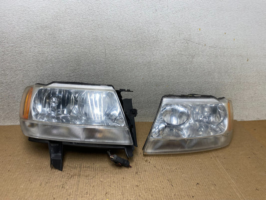 1999 - 2004 Jeep Grand Cherokee Left+Right Set Black Halogen Headlights W5217 DW0